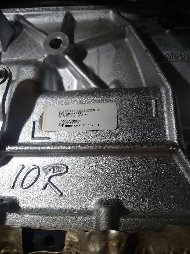 Наклейка с новой стратегией и SOL ID для перепрограммирования TCM после замены гидроблока